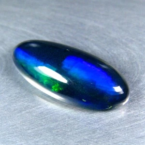 2,55 CT ERSTAUNLICHER BLAU GRÜN FUNKELNDER NATÜRLICHER MASSIVER SCHWARZER OPAL AUS ÄTHIOPIEN - Bild 1 von 3