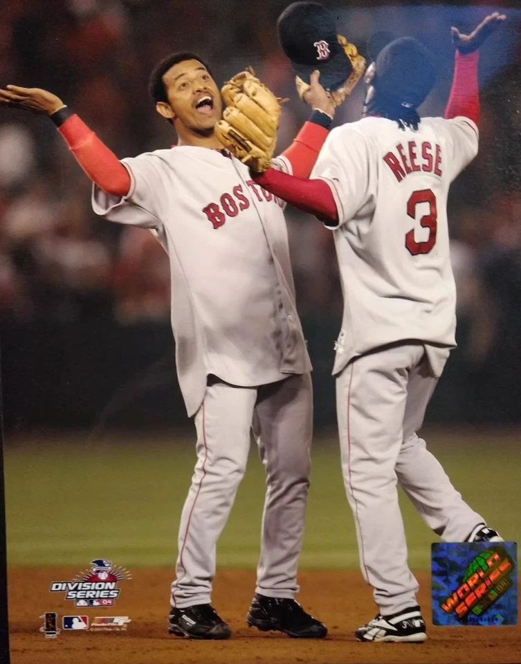 POKEY REESE & ORLANDO CABRERA CELEBRATE WINNING GAME TWO 2004 ALDS 8X10 PHOTO - Image 1 of 1