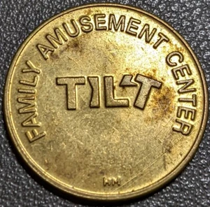 Centro de atracciones familiar Tilt Token sin valor en efectivo comercio de latón - Imagen 1 de 2
