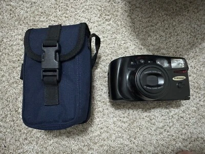 Cámara fotográfica Samsung Máxima Zoom 105 Super Macro 35 mm negra - cubierta de batería rota Foto 1 de 4