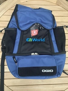 CA World (mochila/bolsa para libros de lona y nailon) azul/negro Ogio enfriador suave - Imagen 1 de 4