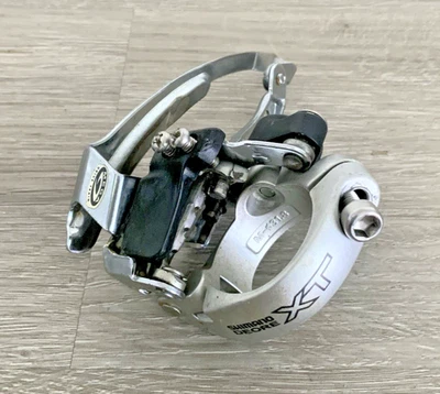 SHIMANO XT FRONT DERAILLEUR M750 TOP PULL 66-69 DEGREE 31.8 MM CLAMP - Image 1 of 4