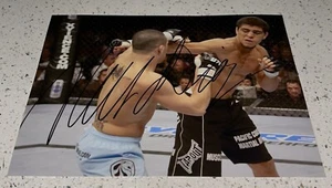NICK DIAZ SIGNED 8X10 PHOTO UFC FIGHTER MMA STRIKEFORCE BOXER WEC IFC AUTOGRAPH - Picture 1 of 1