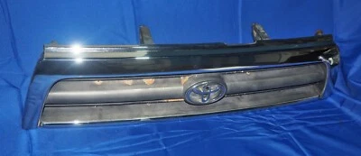 1996-1998 Toyota 4Runner grade dianteira superior emblema conjunto cromado fabricante de equipamento original com garantia - Imagem 1 de 4