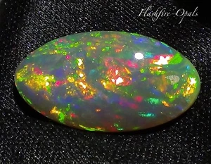 9,21ct. DOPPELS. BLACK GEM WELO OPAL BRILLIANT ROT/GOLD-GRÜN FLASHFIRE-OPALS - Picture 1 of 9