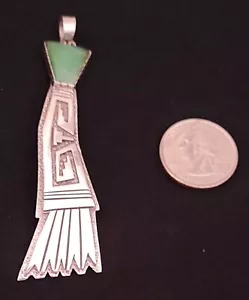 CIONDOLO NAVAJO ARGENTO STERLING NAVAJO CON PEPITA TURCHESE E SFONDO GRANULATO - Foto 1 di 5