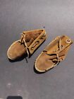 CHILD MOCCASINS WITH BRASS RINGS