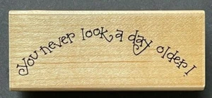 You Never Look A Day Older Birthday Compliment Word Phrase Wood Rubber Stamp - Picture 1 of 3
