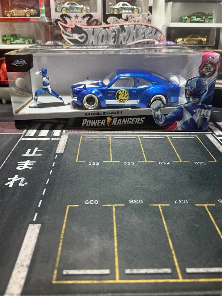 JADA 1974 MAZDA RX-3 & BLUE RANGER FIGURE "POWER RANGERS" 1/24 DIECAST CAR - Image 1 of 1