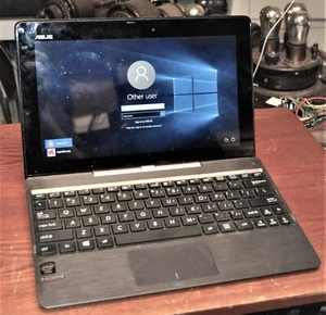 ASUS T100TA-C2 WIN 10 TABLET/NOTEBOOK SMALL CRACK UNDER VOLUME  SCHOOL SURPLUS - Picture 1 of 3
