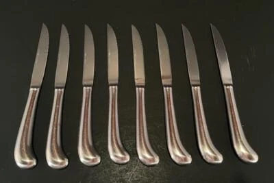 8 CUCHILLOS ROGERS ACERO INOXIDABLE DENTADO 9 3/8" EMPUÑADURA PISTOLA COREA Foto 1 de 4