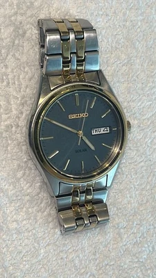 SEIKO V158-0AA0 Solar Two Tone Stainless Steel Men's Watch Gunmetal Dial Mint - Image 1 of 4