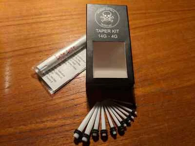 Kit cónico de estiramiento de orejas 14 g - 4 g de Morbid Metals plástico blanco con lubricante lóbulo Foto 1 de 4