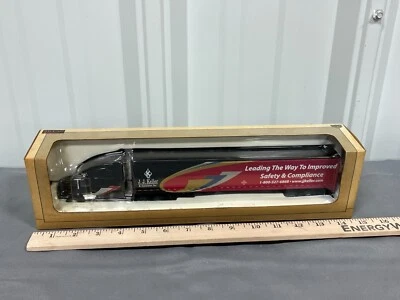 JJ Keller & Associates Volvo 770 w Van Trailer SpecCast 1:64 NIB 31504 - Image 1 of 4