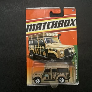 MATCHBOX LAND ROVER DEFENDER 110 LONG CARD TAN 2010 JUNGLE EXPLORERS - Picture 1 of 2