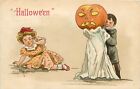 Embossed Halloween Postcard 2214 Boy Scares Girl w/ Jack o Lantern A/S HB Griggs