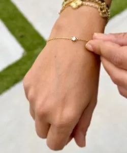 Bracciale oro giallo 14 kt taglio tondo moissanite catena solitario 0,25 ctw - Foto 1 di 15