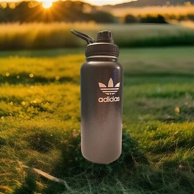 Botella de agua vintage Adidas de acero inoxidable 32 oz - pistola acabado gris metal Foto 1 de 4