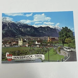 AK Innsbruck Österreich Tirol Alpenkirche Straßenbahn Bus Berg Schnee Baum - Bild 1 von 2