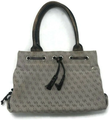 Dooney Bourke Designer Handbag Beige And Brown Canvas Bag With Tassels  - Image 1 of 4