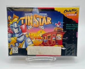 Tin Star Super Nintendo 1994 sellado de fábrica en estuche protector - NUNCA ABIERTO - Imagen 1 de 6