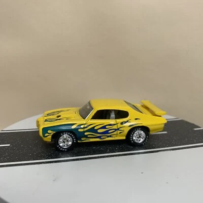 Matchbox Premiere Hot Rod Collection Series 11 Pontiac GTO Yellow w/Blue Flames - Image 1 of 4