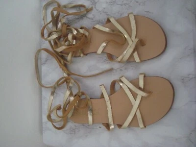 Espléndidas sandalias de tanga para mujer color dorado gladiador punta redonda 6 M Foto 1 de 4