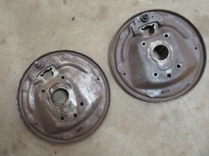 1957 Pontiac Chieftain front spindle brake shoe backing mount plate set pair - Picture 1 of 3