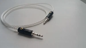 AMP de auriculares con cable auxiliar de audio mini macho occ plateado de 3,5 mm a 3,5 mm  - Imagen 1 de 2
