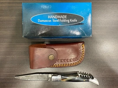 Cuchillo plegable de acero Damasco hecho a mano con sacacorchos Foto 1 de 4