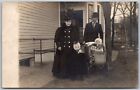 Postcard RPPC Family Bundled Up For A Walk Wicker Baby Carriage Buggy Pram R03