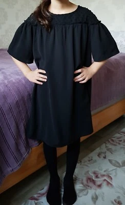 Robe noire fille pour fête, manches courtes. Kiabi 10 ans - Photo 1/4