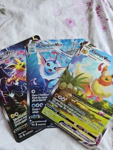 JUMBO KARTEN SET Vaporeon VMAX SWSH182 Jolteon VMAX SWSH184 Flareon VMAX SWSH180 - Bild 1 von 7