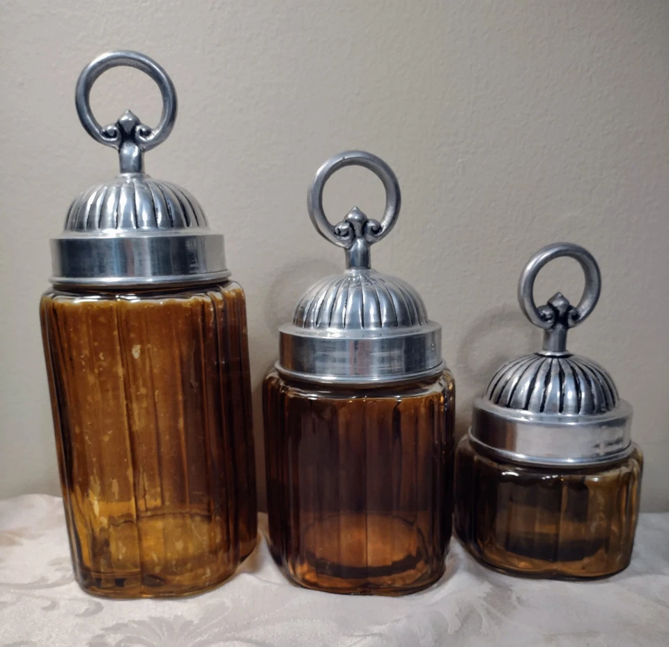Juego de 3 botes de vidrio acanalado color ámbar con tapas de estaño Foto 1 de 3