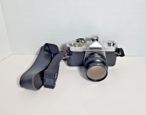 Cámara réflex Konica Autoreflex A3 con lente de 50 mm f/1,7 - Piezas no probadas con estuche - Imagen 1 de 21