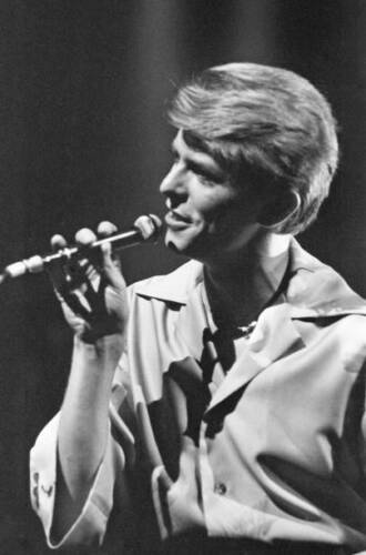 British pop singer David Bowie performing on stage during his conc- Old Photo 1