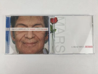 THIRTY SECONDS TO MARS 2 CD LOT: A Beautiful Lie, This is War - Image 1 of 4