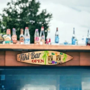 ‘Tiki Bar Open’ Metal Novelty Surfboard Sign: 17” L  x 4.5” - Picture 1 of 2