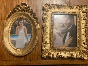 2 gold picture frames, one 4" by 6" and an oval frame that's 3.5" x 5" brand new - Picture 1 of 3