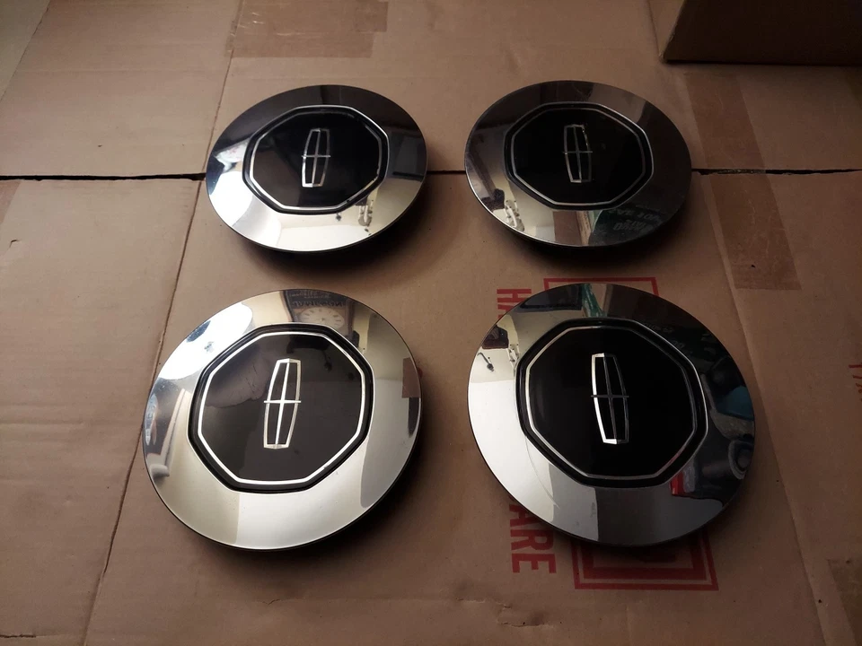 Juego de 4 tapas centrales cromadas de 8 radios llanta 16" Lincoln Town Car 1996-97 OEM raro Foto 1 de 4