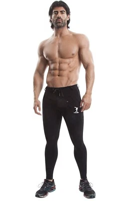 Pantalones deportivos negros de algodón ajustados negros para hombre con bolsillos cordón cintura Foto 1 de 3