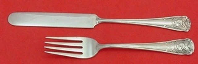 Juego de cuchillos y tenedores H 109 de Gorham de plata esterlina junior todo plano con niño Foto 1 de 2