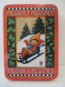 Mary Engelbreit Navidad Lata Merrily Merrily Niño en Trineo Acebo 1986 - Imagen 1 de 7