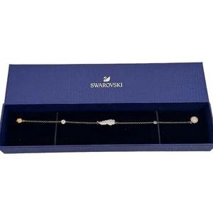 Swarovski Remix Collection Feather Strand Bracelet White, Rose-gold tone Large - Picture 1 of 3