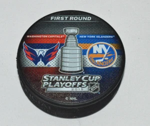 WASHINGTON CAPITALS vs NEW YORK ISLANDERS 2017 STANLEY CUP PLAYOFFS DUELING PUCK - Picture 1 of 2