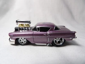 CUSTOM 1958 CHEVY IMPALA   2003 FUNLINE MERCHANDISE INC.  MUSCLE MACHINES   1:64 - Picture 1 of 5