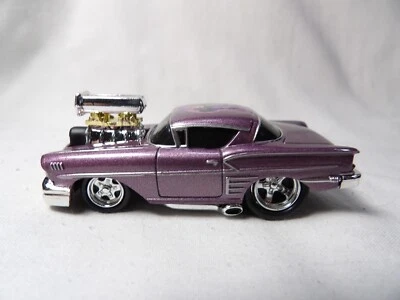 CUSTOM 1958 CHEVY IMPALA   2003 FUNLINE MERCHANDISE INC.  MUSCLE MACHINES   1:64 - Image 1 of 4