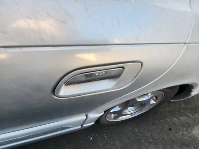 1998-1999-00-01-2002 LINCOLN CONTINENTAL LEFT REAR EXTERIOR DOOR HANDLE TS PAINT - Image 1 of 2