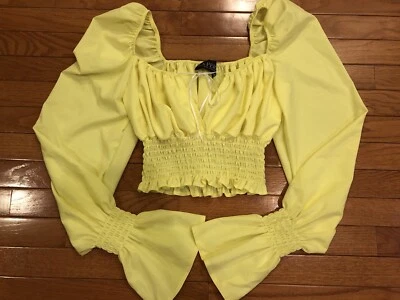 Top corto La Perla amarillo manga larga hecho en Polonia talla 36 europea Foto 1 de 4