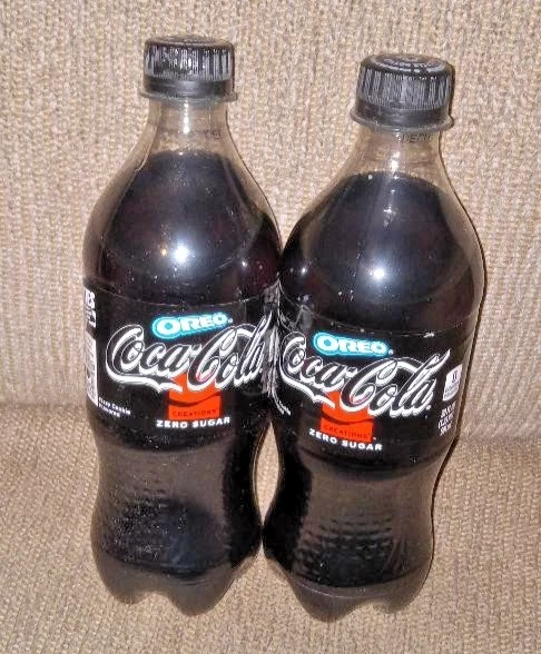 2 Coca Cola Oreo Zero 20oz bottles of soda Expired December 2, 2024 Sealed coke - Image 1 of 1
